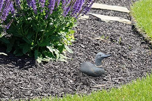 4 inch Boulder Duck stone statue displayed in garden mulch bed