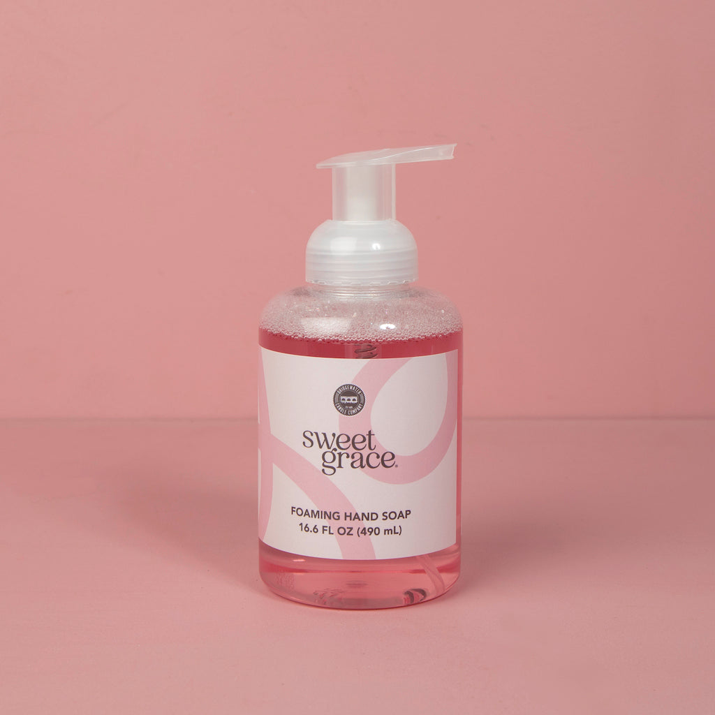 Sweet Grace Foaming Hand Soap bottle on pink background