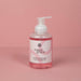 Sweet Grace Foaming Hand Soap bottle on pink background
