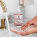 Sweet Grace Foaming Hand Soap at marble sink with brass faucet