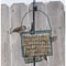 C&S EZ Fill cage bird feeder shown open and ready to load with a suet cake