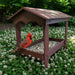 Ground Tray Feeder with Roof in use