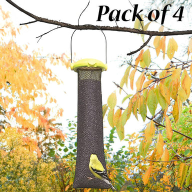 Gardman yellow flip top mesh thistle seed bag hanging in autumn trees with a goldfinch feeding