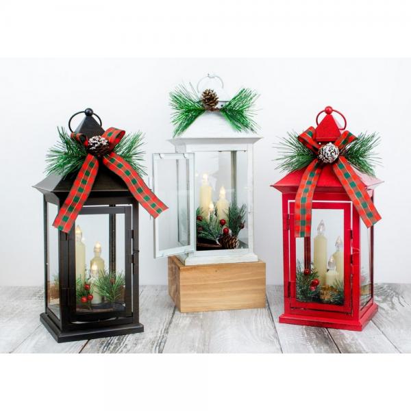 Black ivy and berry LED lantern displayed with holiday lanterns and greenery
