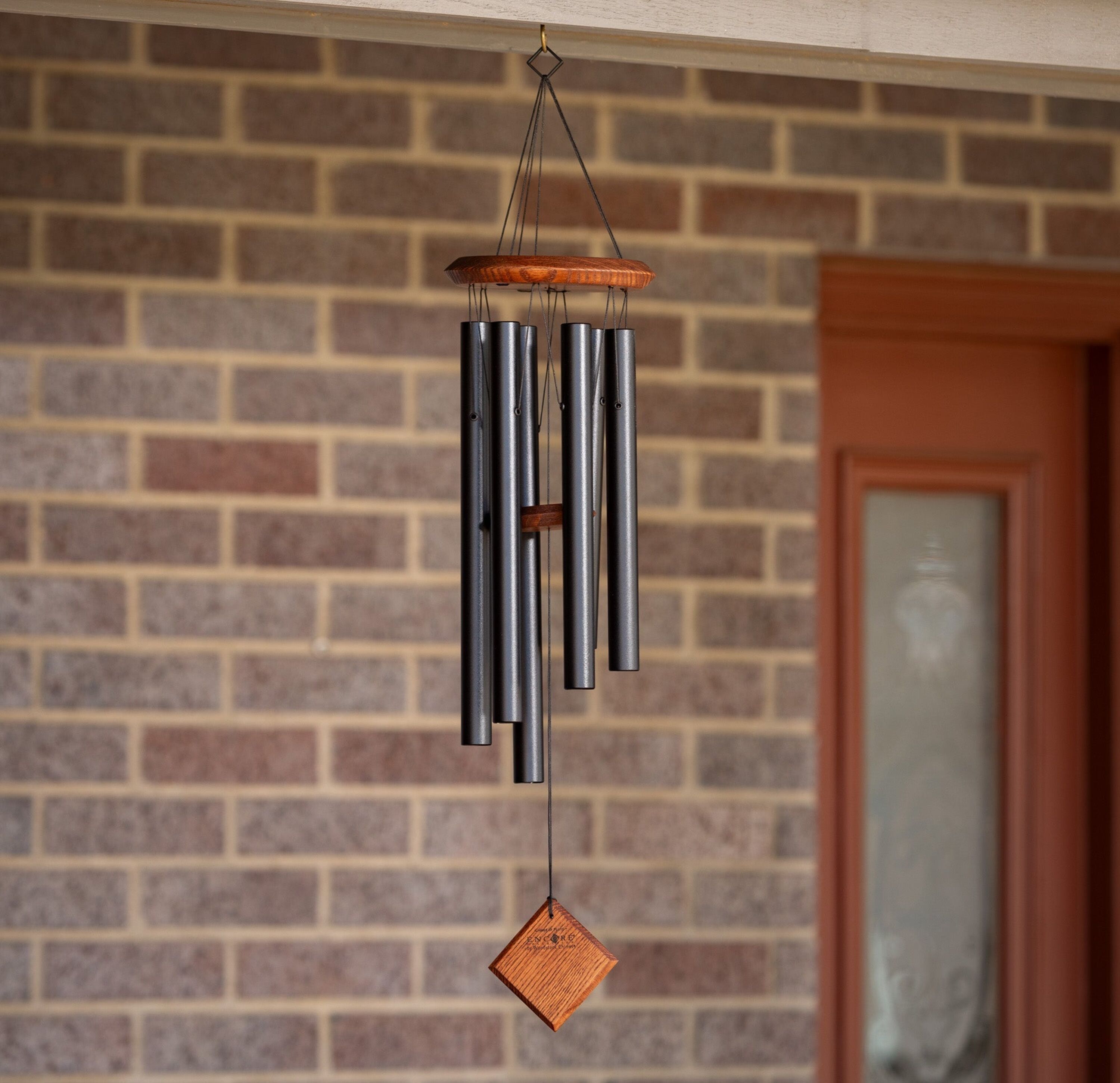 Chimes of Pluto Black/Teak windcatcher detail