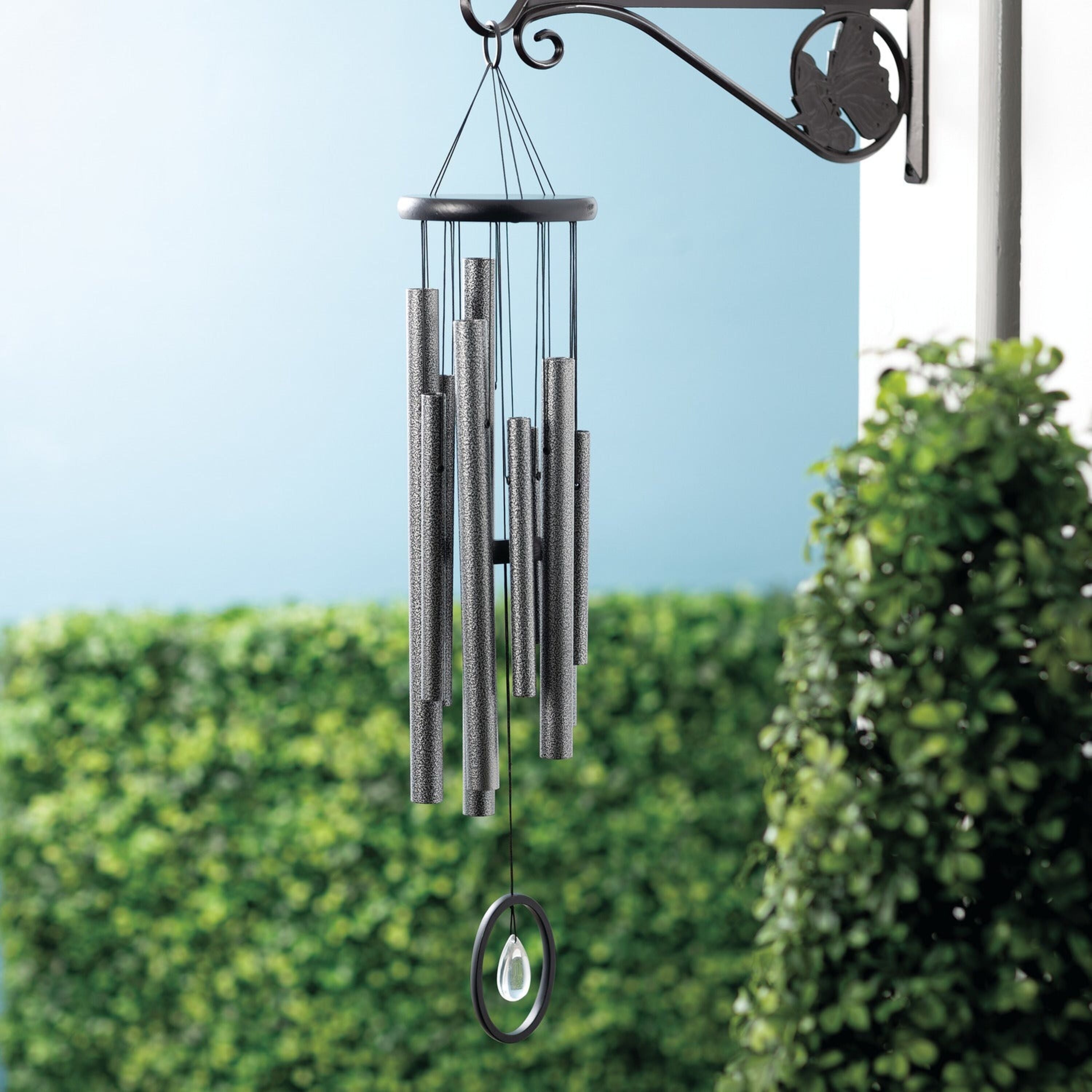 Woodstock Chimes of Crystal Silence wind chime hanging outdoors - Large, Antique Silver