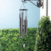 Woodstock Chimes of Crystal Silence wind chime hanging outdoors - Large, Antique Silver
