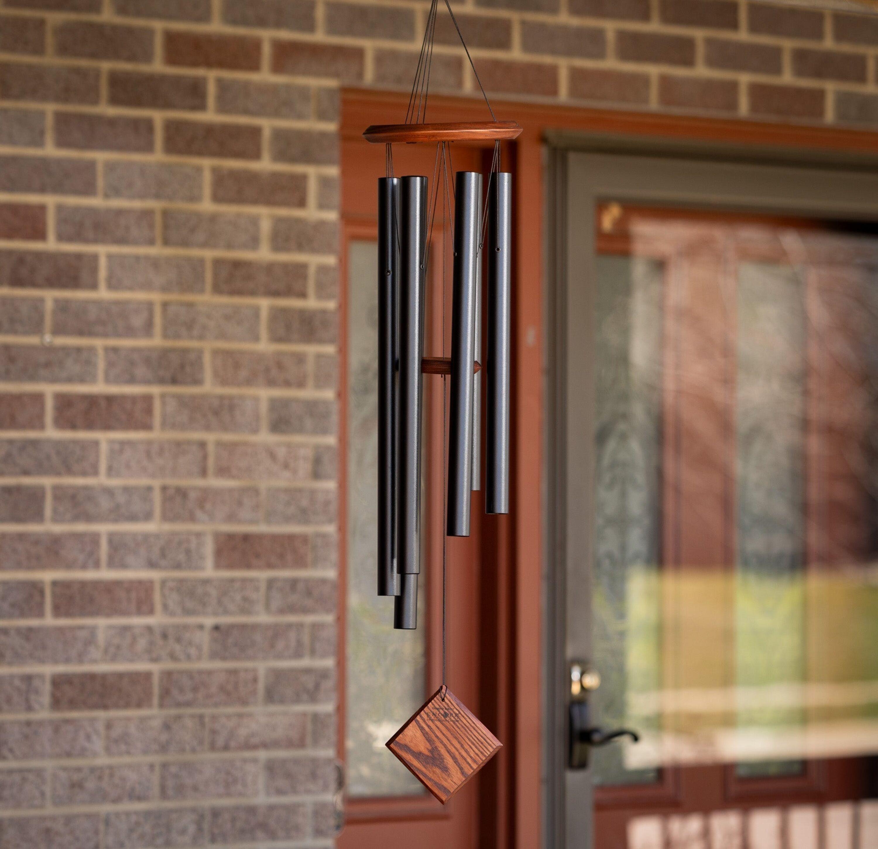 Chimes of Earth hanging outdoors