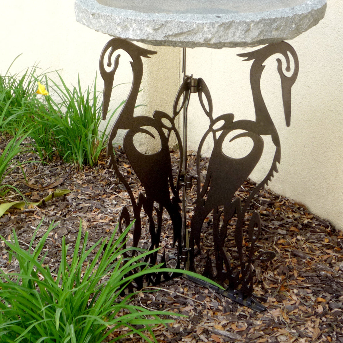 Crane laser cut birdbath base in use with charcoal top