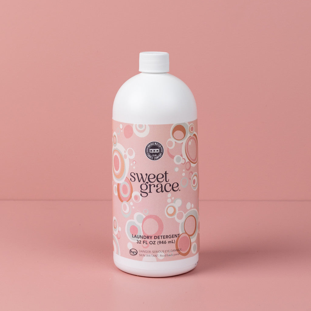 Sweet Grace 32oz Laundry Detergent bottle on pink background