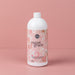 Sweet Grace 32oz Laundry Detergent bottle on pink background