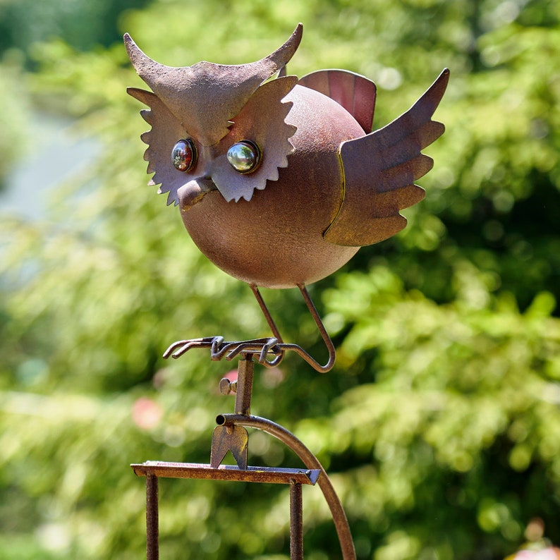 Rusty animal garden swing stake, owl style with glass ball
