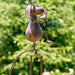 Rusty animal garden swing stake, dog style with glass ball
